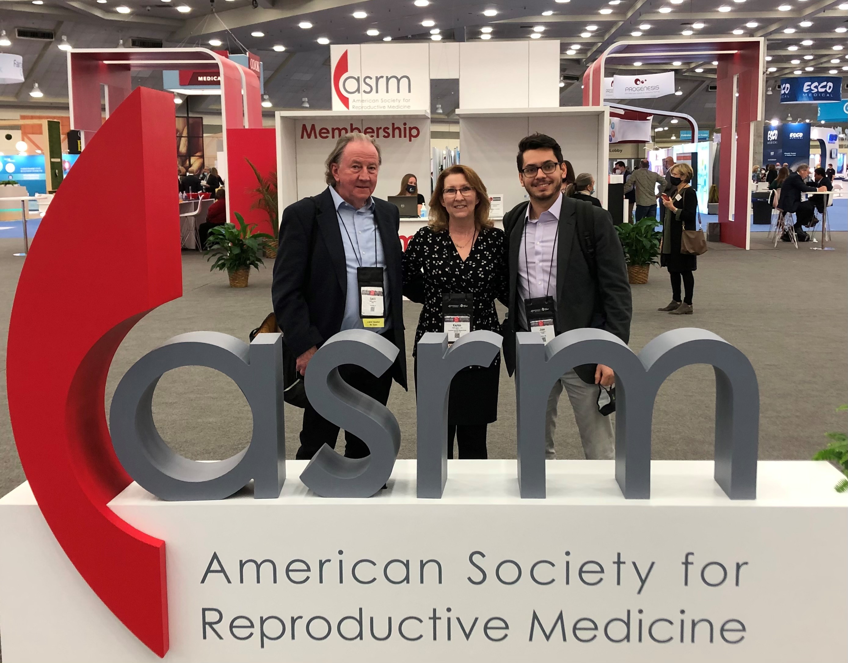 Kaylon (center) with research colleagues Kevin Osteen, PhD (left) and Juan Gnecco, PhD (right) at the annual conference of the American Society for Reproductive Medicine in 2021